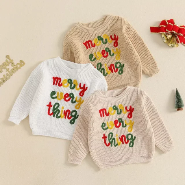 3 toddler sweaters with christmas writing in festive colors